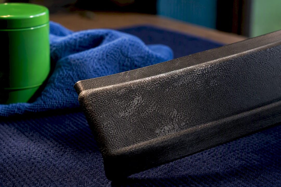 Wax residue on textured black plastic trim