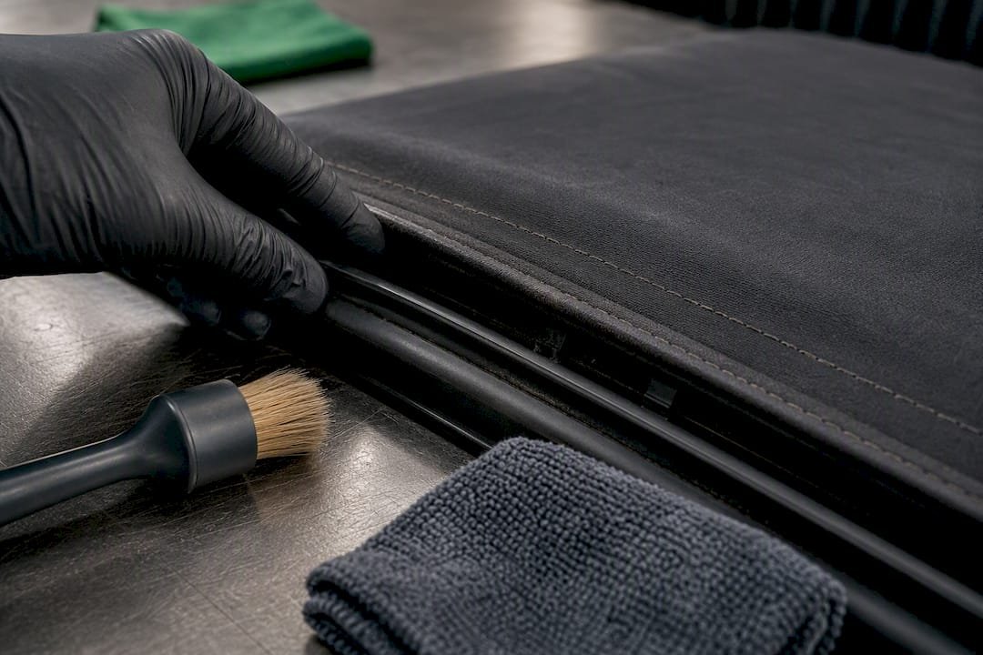 Close-up inspection of soft-top seam and seal