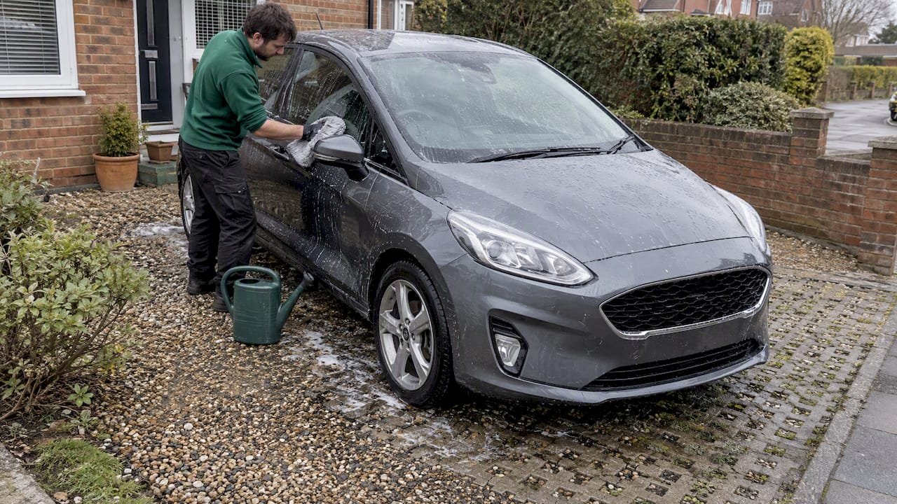 Car wash water soaking into permeable paving
