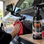 Diamondbrite Ceramic Glaze beside glossy coated car door
